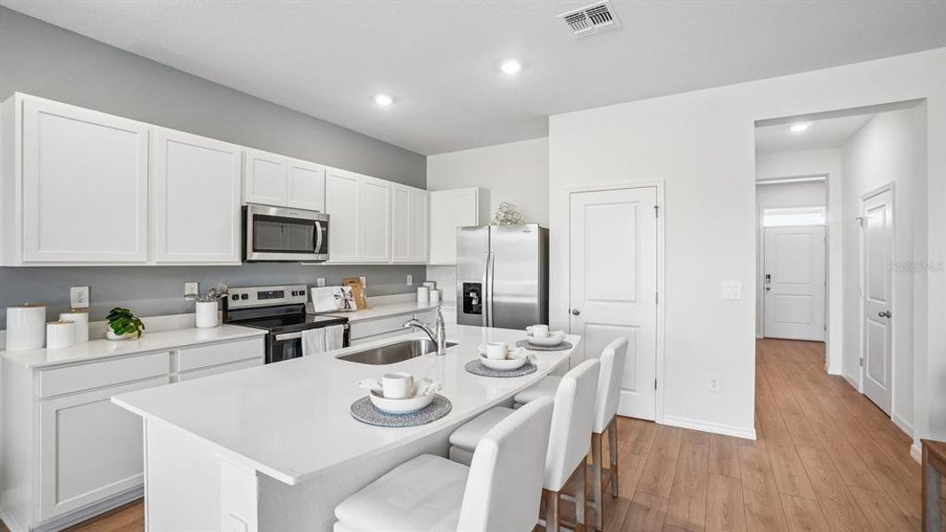 Furnished interior view inside a new home in Sanctuary at Citrus Park Townhomes, Tampa (Image 17).