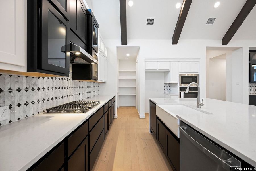 Furnished interior view inside a new home in The Crossvine, Schertz (Image 6).