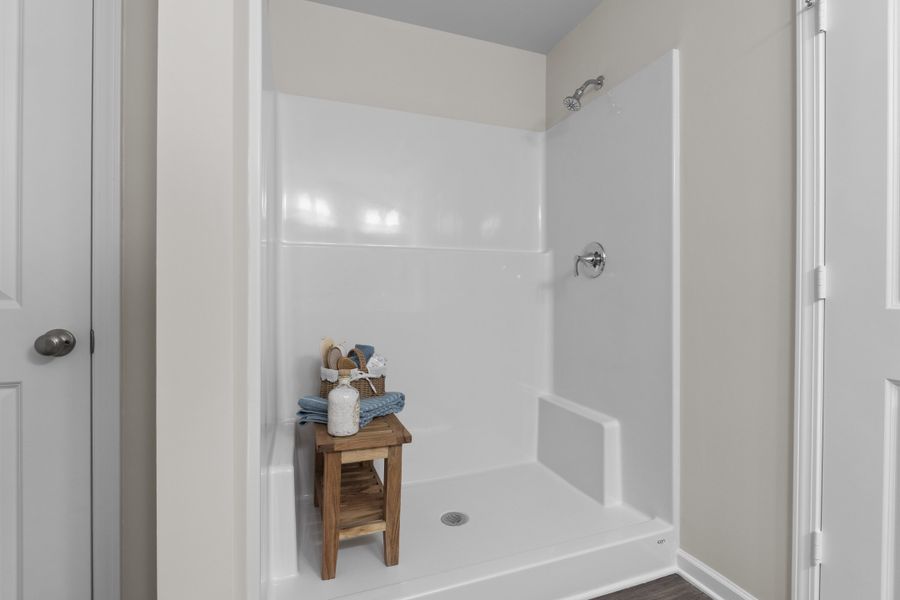 Representative furnished interior of a home built from the Alder C by McGuinn Homes in Forts Ridge, Pelion (Image 58).