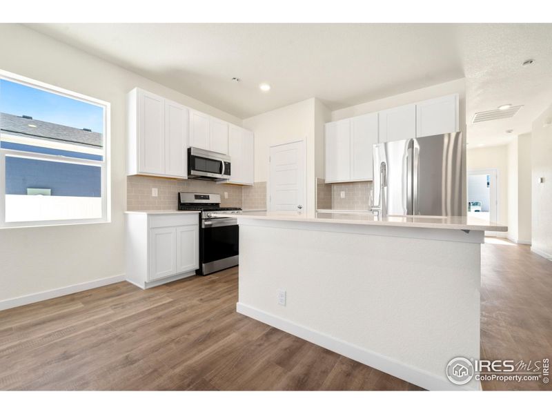 Furnished interior view inside a new home in Liberty Draw, Evans (Image 5).