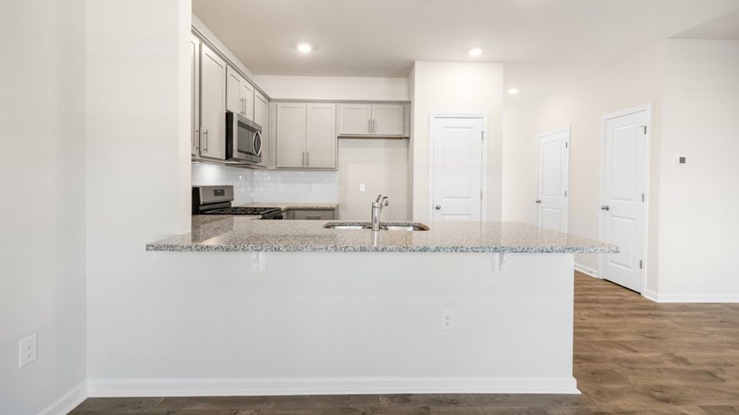 Furnished interior view inside a new home in Clock Road Townhomes, New Bern (Image 9).