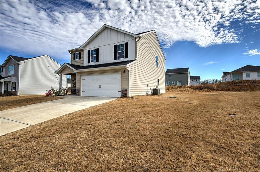 Front exterior of a new home in Kingston Park, Kingston, GA, highlighting curb appeal (Image 23).