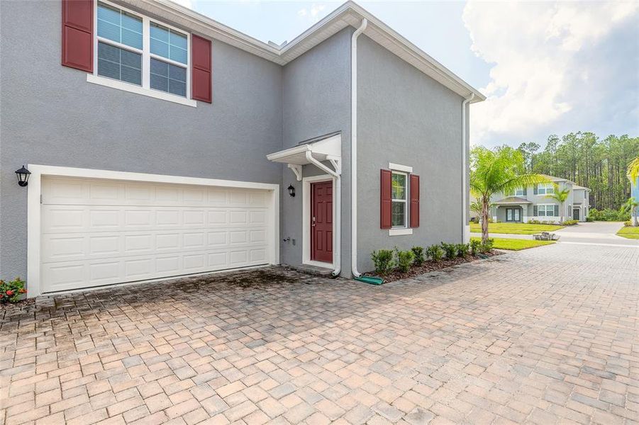 Front exterior of a new home in , New Smyrna Beach, FL, highlighting curb appeal (Image 23). Front exterior of a new home in , New Smyrna Beach, FL, highlighting curb appeal (Image 23).