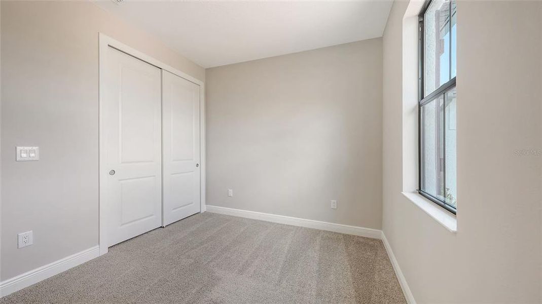 Spacious, unfurnished interior of a new home in Woodland Preserve, Parrish (Image 30).