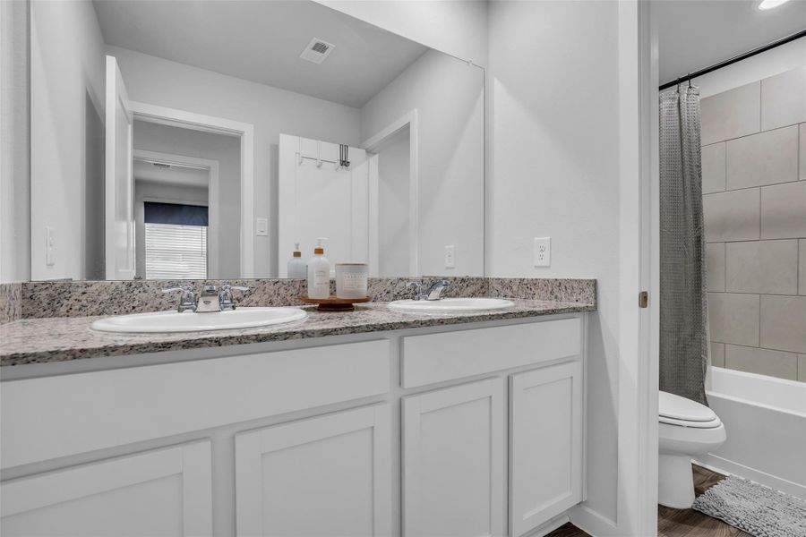 3rd Bathroom with double sink, private 3rd Bathroom bathtub/shower and toilet on the 2nd floor