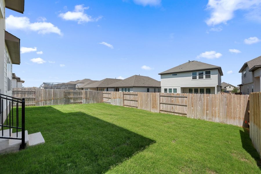 Exterior details and patio area of a home in Park Central, Georgetown (Image 26).