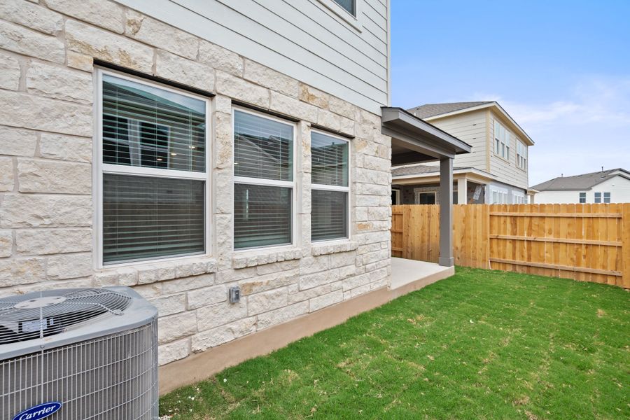 Exterior details and patio area of a home in Park Central, Georgetown (Image 29).