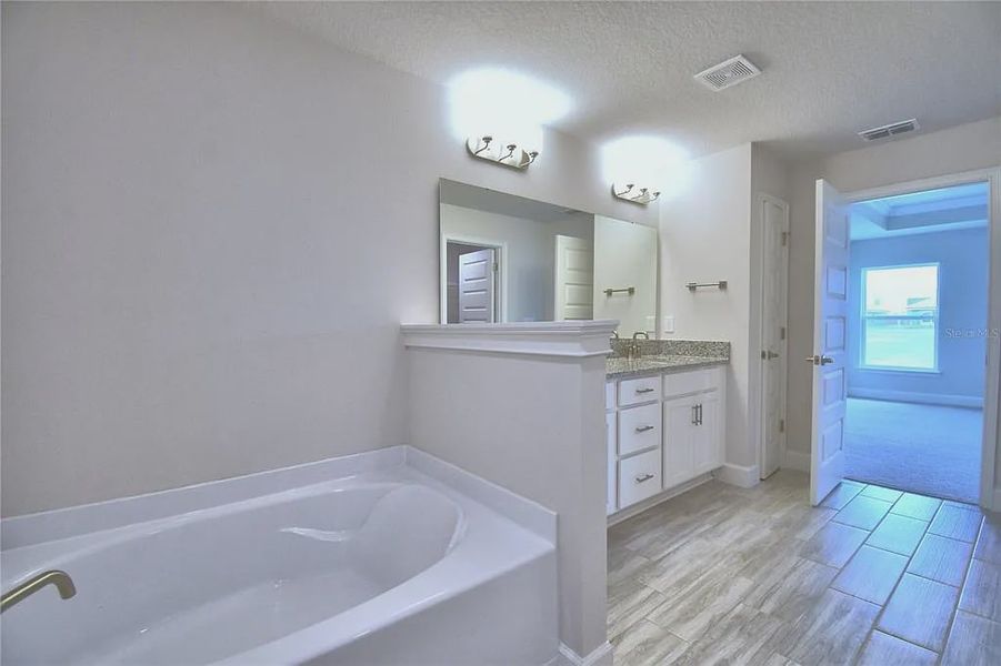 Furnished interior view inside a new home in Lake Juliana Estates, Auburndale (Image 14).