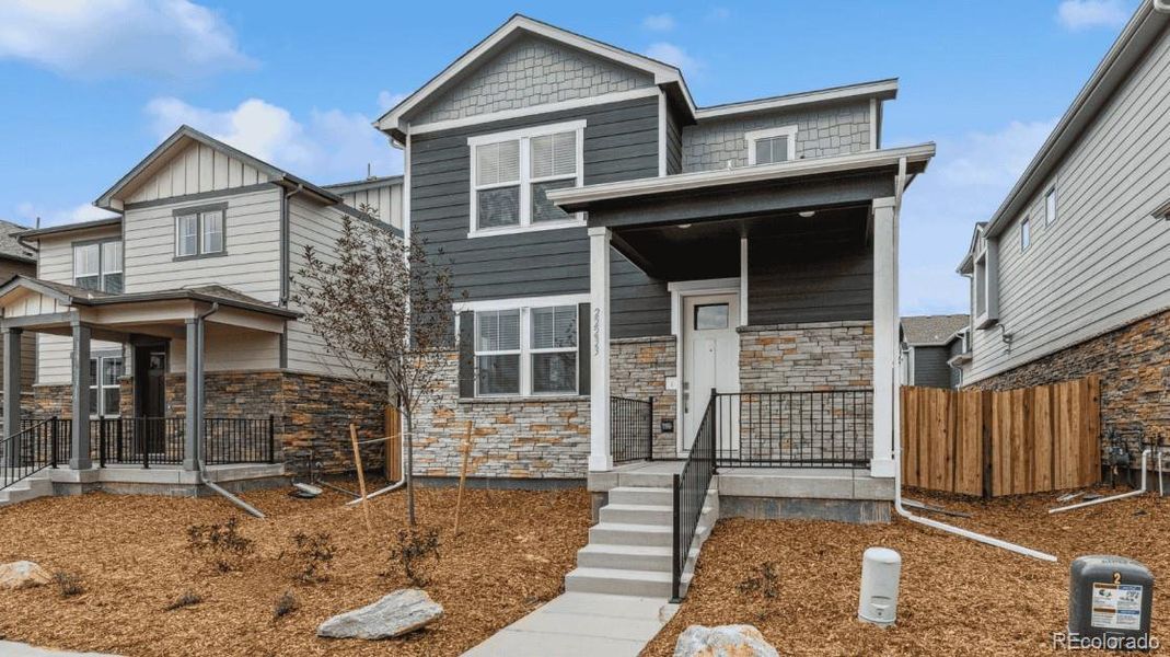 Exterior details and patio area of a home in Horizon Uptown, Aurora (Image 17). Exterior details and patio area of a home in Horizon Uptown, Aurora (Image 17).