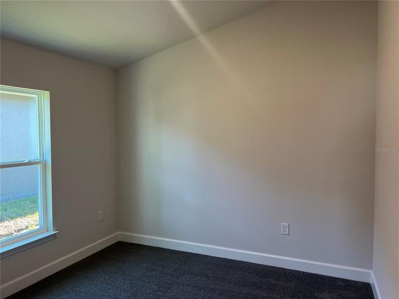 Spacious, unfurnished interior of a new home in Abbey Glen, Dade City (Image 13).