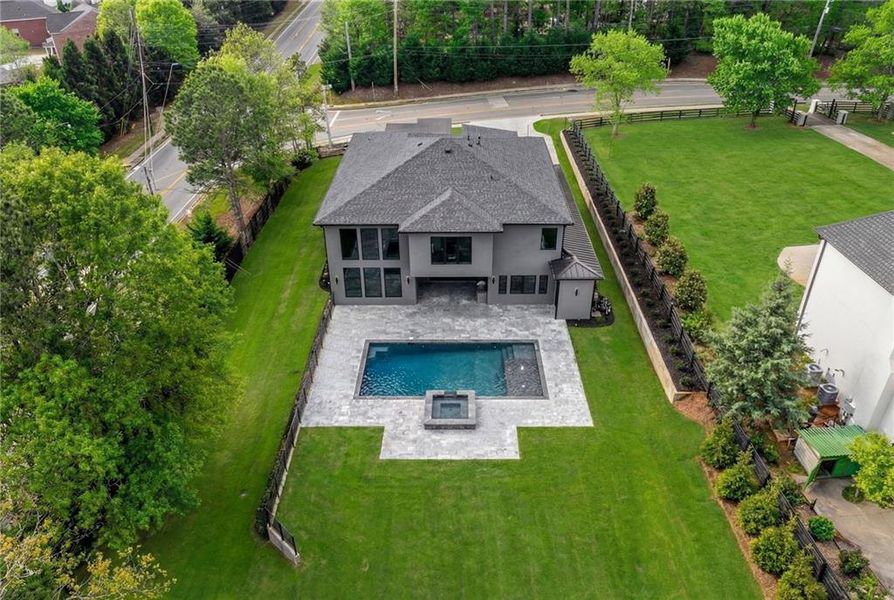 Front exterior of a new home in , Sugar Hill, GA, highlighting curb appeal (Image 26). Front exterior of a new home in , Sugar Hill, GA, highlighting curb appeal (Image 26).