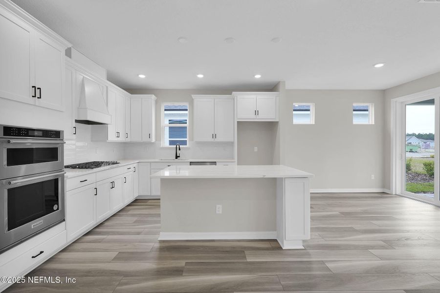 Furnished interior view inside a new home in Del Webb Wildlight, Yulee (Image 18).