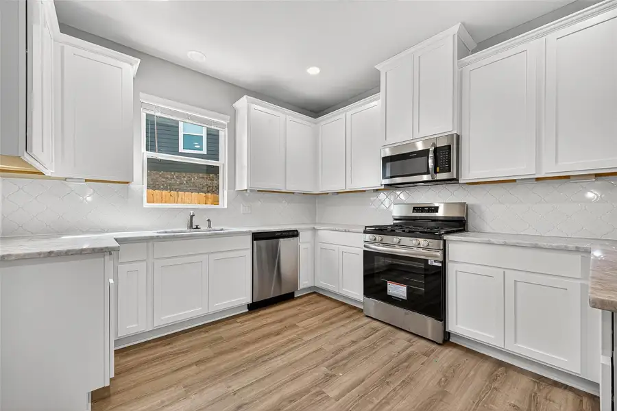 Furnished interior view inside a new home in Sunterra, Katy (Image 6). Furnished interior view inside a new home in Sunterra, Katy (Image 6).