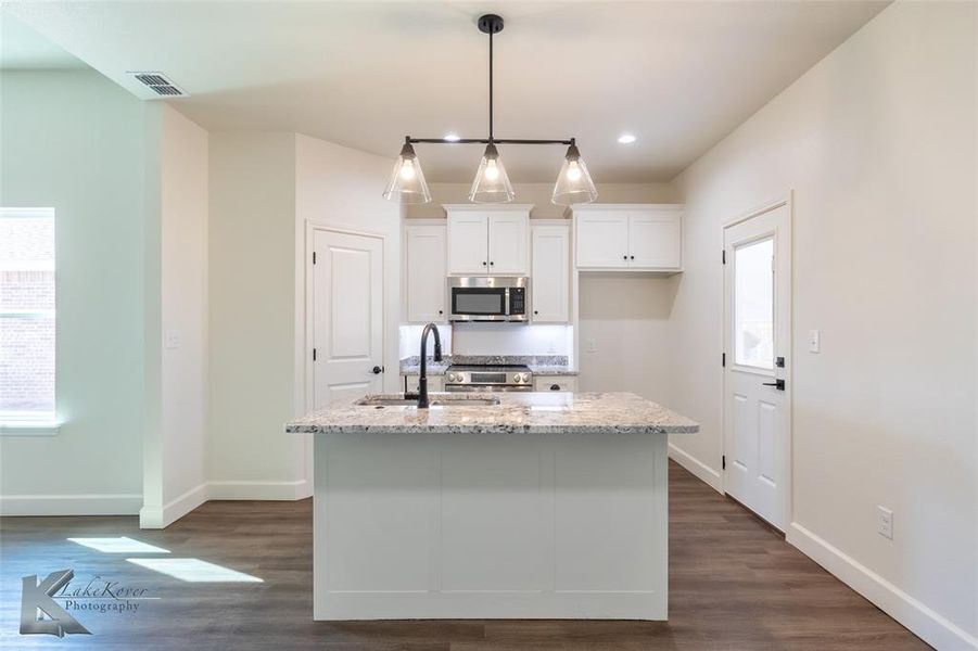 Furnished interior view inside a new home in , Abilene (Image 6).