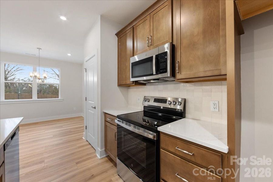 Kitchen with Electric Oven Range