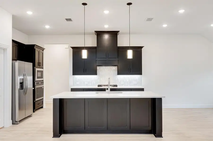 Furnished interior view inside a new home in Terracina, Rockwall (Image 6).