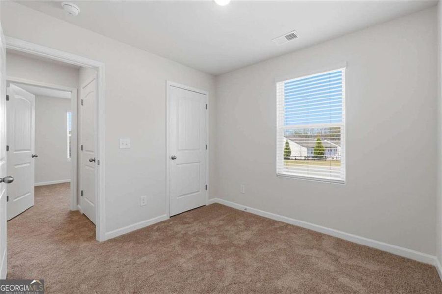 Spacious, unfurnished interior of a new home in The Grove At Mundy Mill, Gainesville (Image 22).