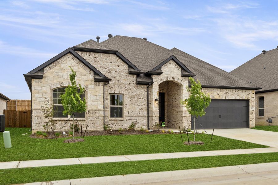 Representative exterior photo of a completed home built from the Colby by Sandlin Homes in Lakesong, Midlothian, TX (Image 22). Representative exterior photo of a completed home built from the Colby by Sandlin Homes in Lakesong, Midlothian, TX (Image 22).