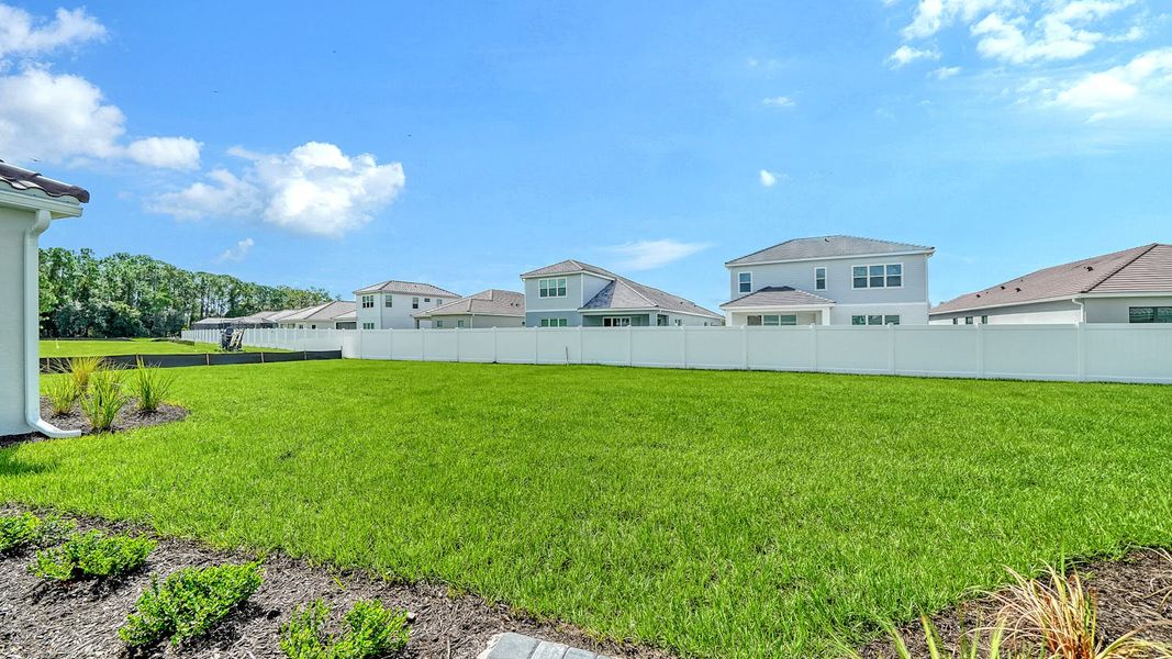 Exterior details and patio area of a home in Windward Real Estate and Homes for Sale in Sarasota, FL - Neal Communities, Lakewood Ranch (Image 2).