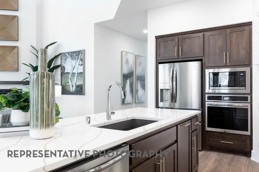 Furnished interior view inside a new home in Wolf Ranch, Georgetown (Image 33).