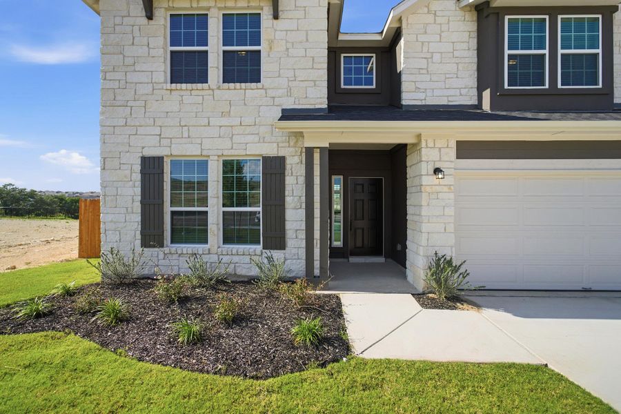 Exterior details and patio area of a home in Lariat, Liberty Hill (Image 3). Exterior details and patio area of a home in Lariat, Liberty Hill (Image 3).