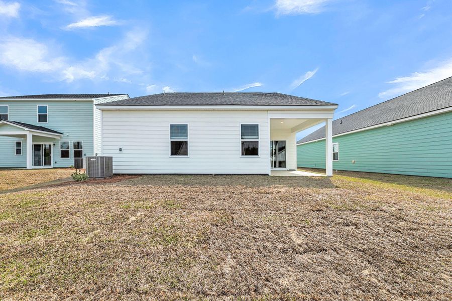 Exterior details and patio area of a home in , Ravenel (Image 22).