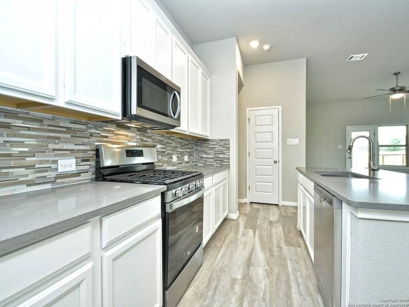 Furnished interior view inside a new home in Sagebrooke - Premier Series, San Antonio (Image 6).