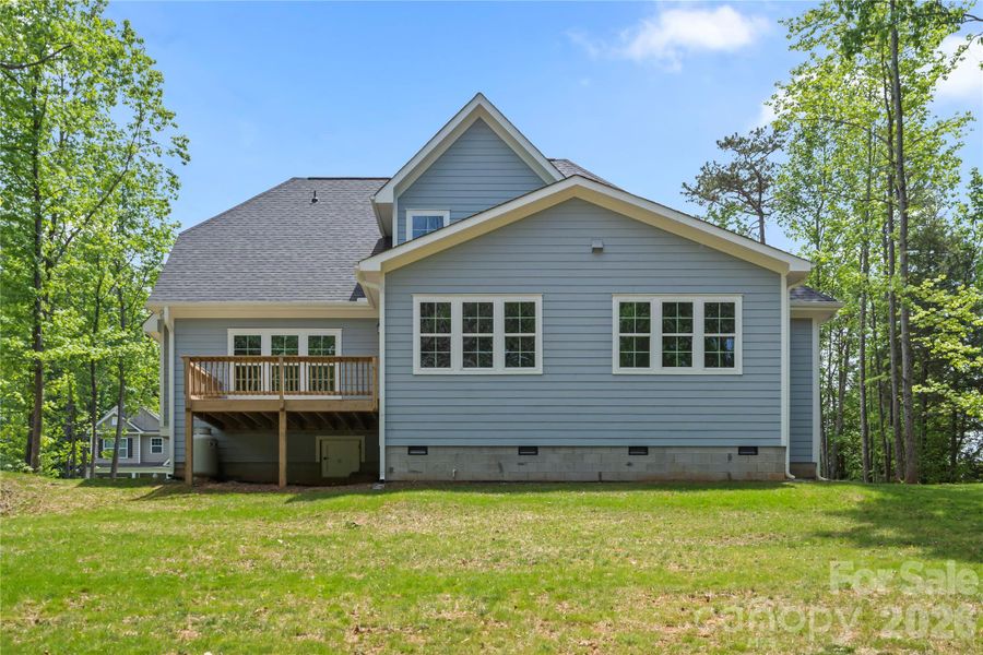 Exterior details and patio area of a home in , Mooresville (Image 24).