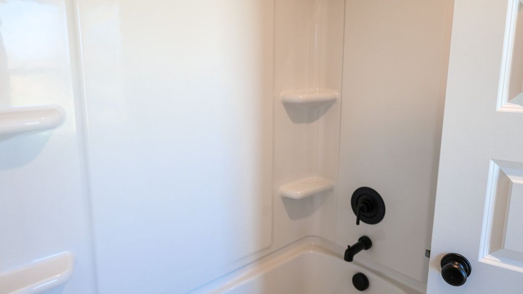 Representative interior finishes for a home built from the STONEBROOK II by D.R. Horton in Harvest Point, Spring Hill (Image 35).