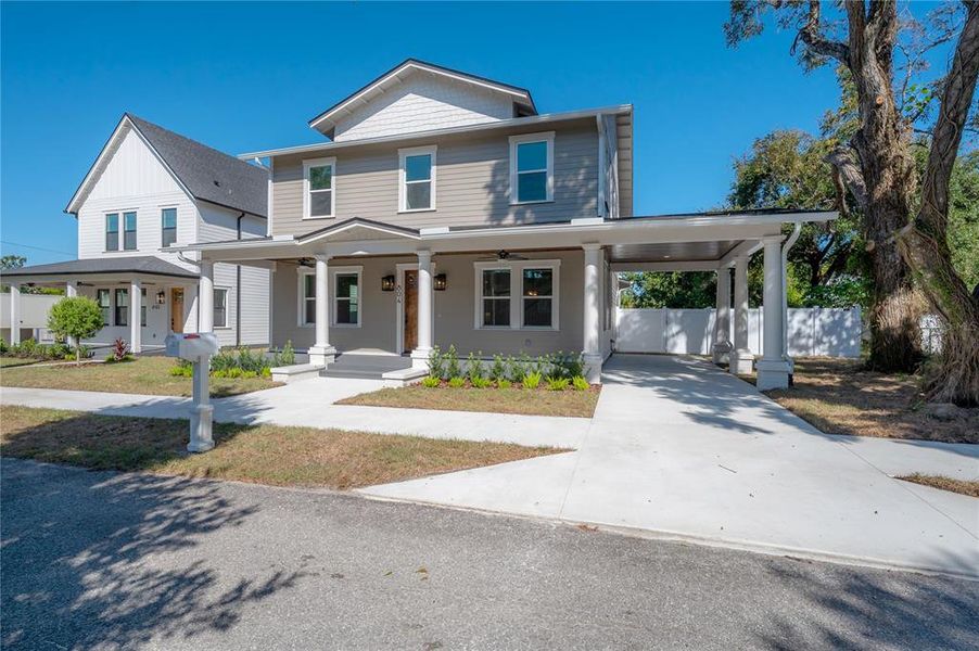 Front exterior of a new home in , Tampa, FL, highlighting curb appeal (Image 27). Front exterior of a new home in , Tampa, FL, highlighting curb appeal (Image 27).