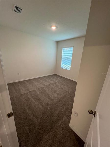 Spacious, unfurnished interior of a new home in Epperson, Wesley Chapel (Image 40).