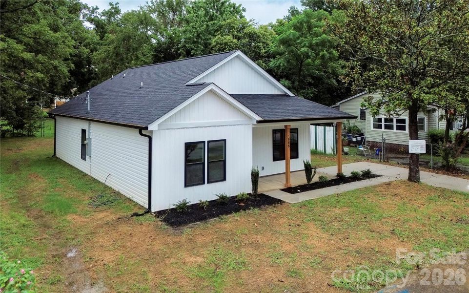 View from the air showing the Driveway and entry to the House.