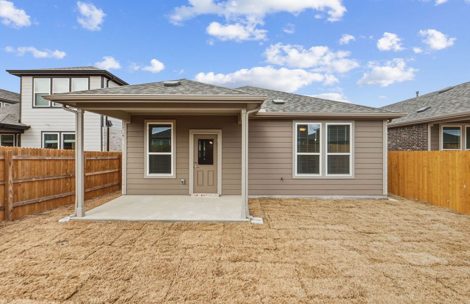 Exterior details and patio area of a home in Crosswinds, Kyle (Image 25).