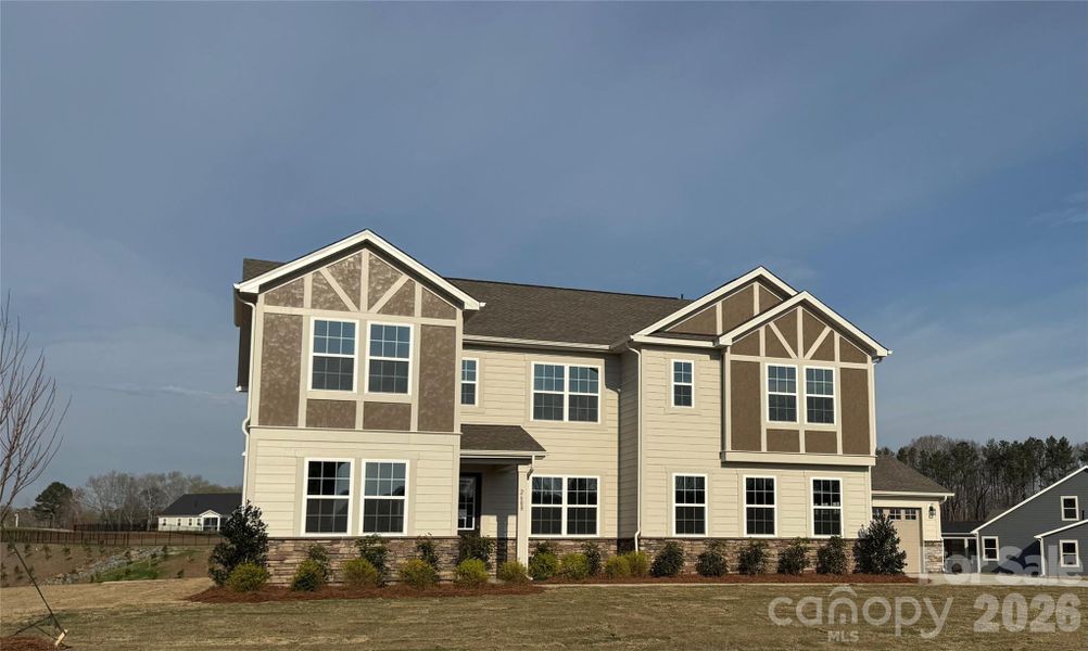 Front exterior of a new home in Blair Place, Monroe, NC, highlighting curb appeal (Image 5).