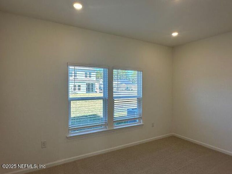 Spacious, unfurnished interior of a new home in Brook Forest - Villas, St. Augustine (Image 15).
