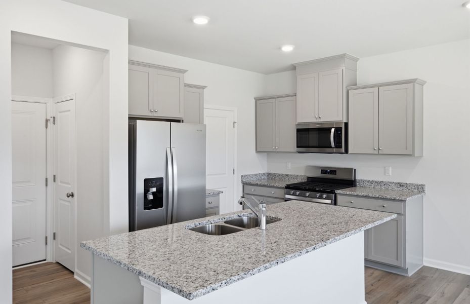 Furnished interior view inside a new home in Saunders Farm, Willow Spring (Image 8).