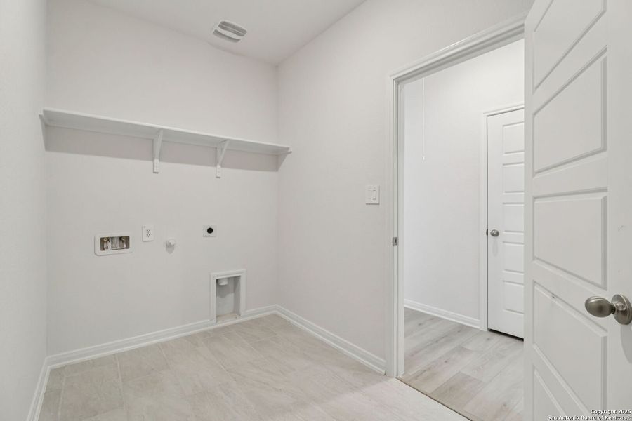 Spacious, unfurnished interior of a new home in Legendary Trails - Classic Series, Cibolo (Image 37). Spacious, unfurnished interior of a new home in Legendary Trails - Classic Series, Cibolo (Image 37).