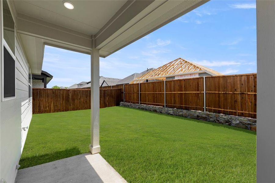 Exterior details and patio area of a home in Walden Pond, Forney (Image 4).
