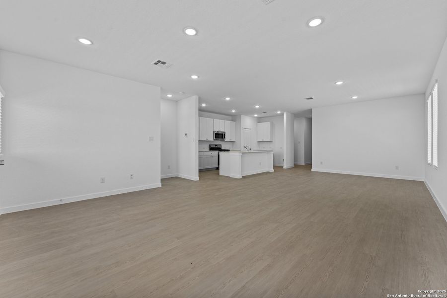 Spacious, unfurnished interior of a new home in Waterwheel: Coastline Collection, San Antonio (Image 15).