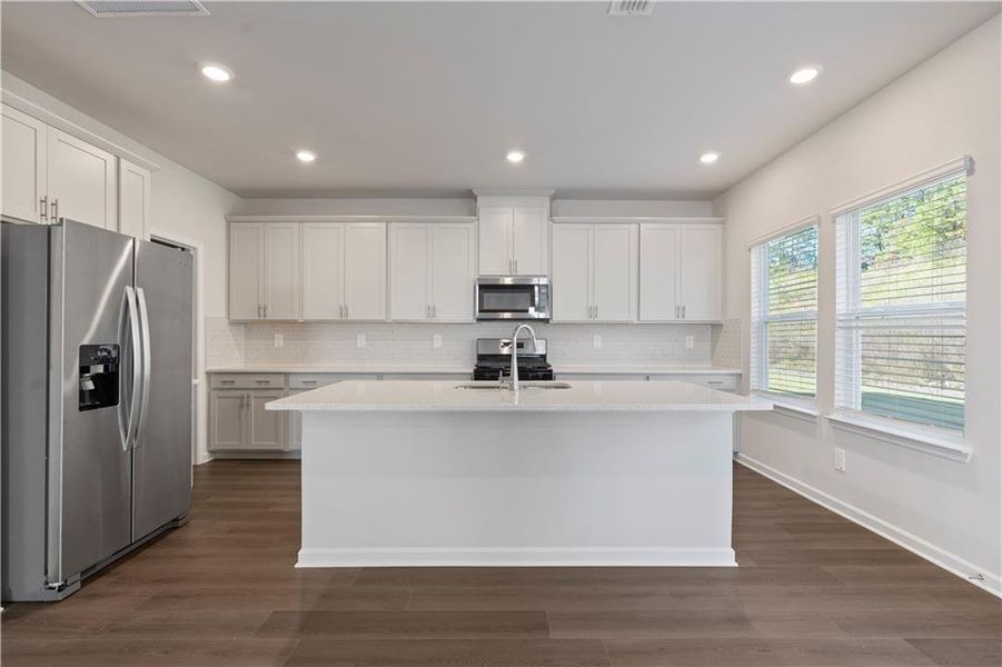 Furnished interior view inside a new home in Hamilton Crossing, Buford (Image 7).