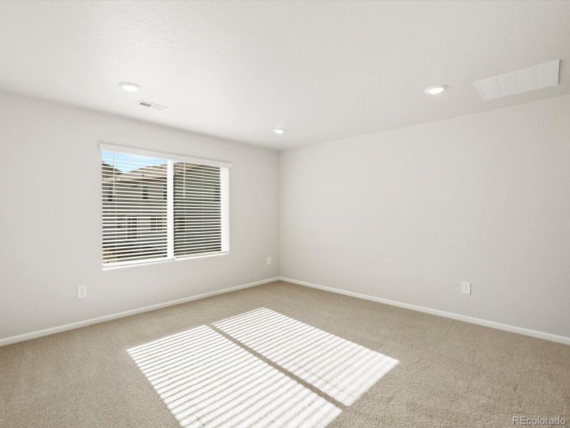 Spacious, unfurnished interior of a new home in Poudre Heights: The Lakes Collection, Windsor (Image 26).