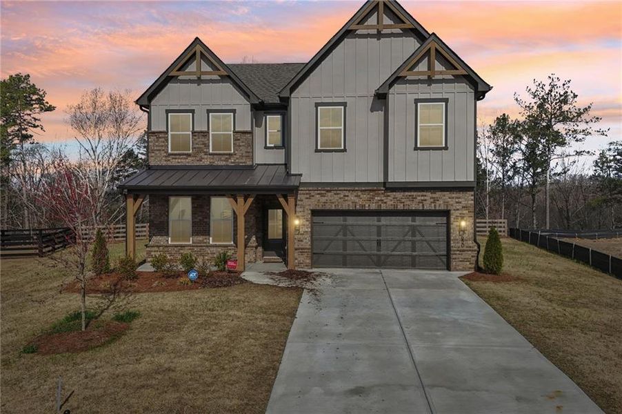 Front exterior of a new home in Tiberon Woods, Cumming, GA, highlighting curb appeal (Image 27). Front exterior of a new home in Tiberon Woods, Cumming, GA, highlighting curb appeal (Image 27).