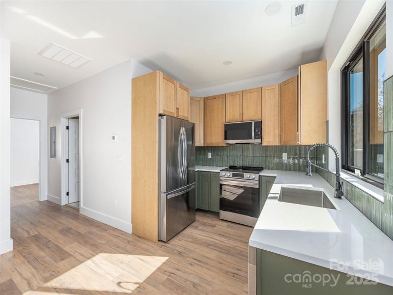 Furnished interior view inside a new home in , Waynesville (Image 4).