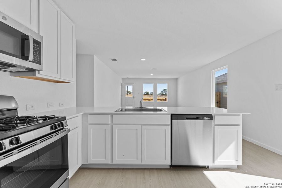 Furnished interior view inside a new home in Randolph Crossing: Cottage Collection, Converse (Image 7). Furnished interior view inside a new home in Randolph Crossing: Cottage Collection, Converse (Image 7).