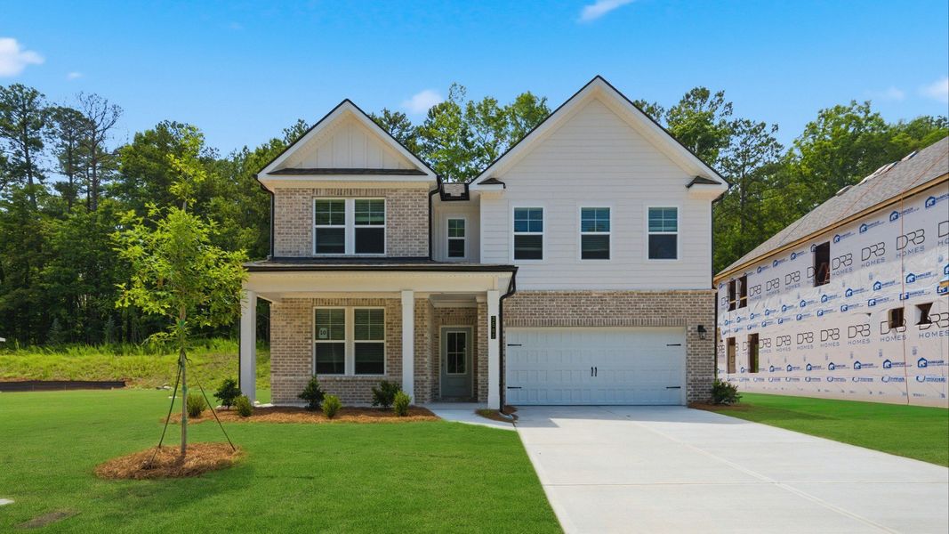 Representative exterior photo of a completed home built from the Wynwood by DRB Homes in Hamilton Lakes, Lawrenceville, GA (Image 24). Representative exterior photo of a completed home built from the Wynwood by DRB Homes in Hamilton Lakes, Lawrenceville, GA (Image 24).