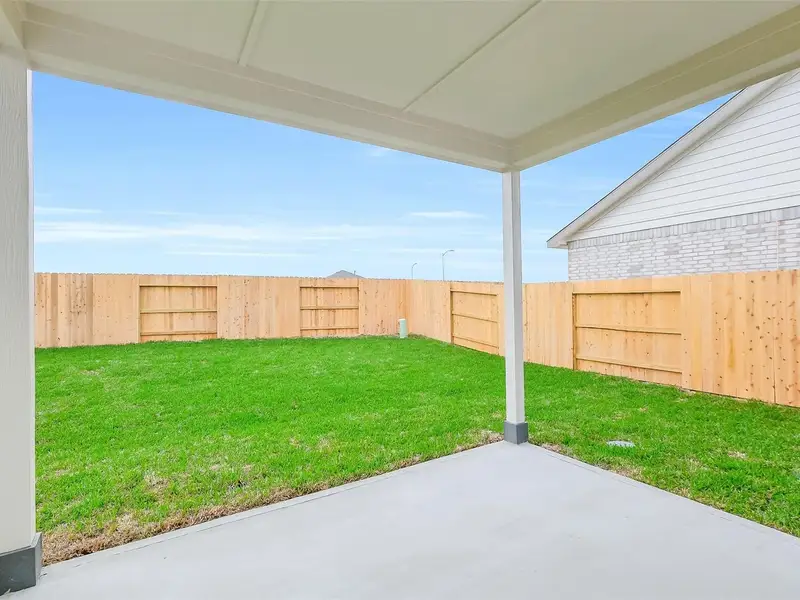 Exterior details and patio area of a home in Emberly, Beasley (Image 4).