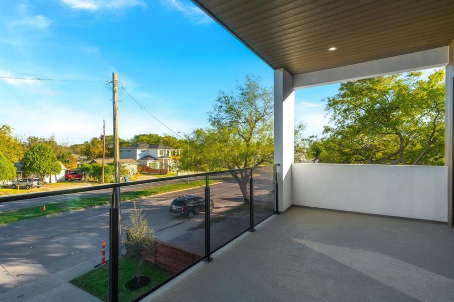 Covered balcony off game room, overlooking front of house. Covered balcony off game room, overlooking front of house.