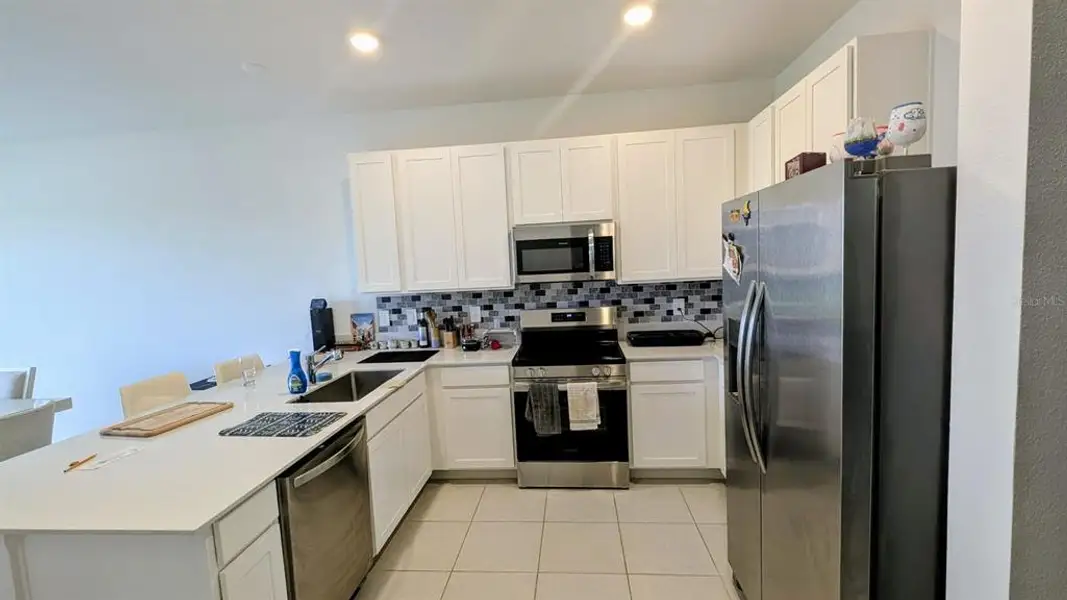 Furnished interior view inside a new home in , Davenport (Image 3).