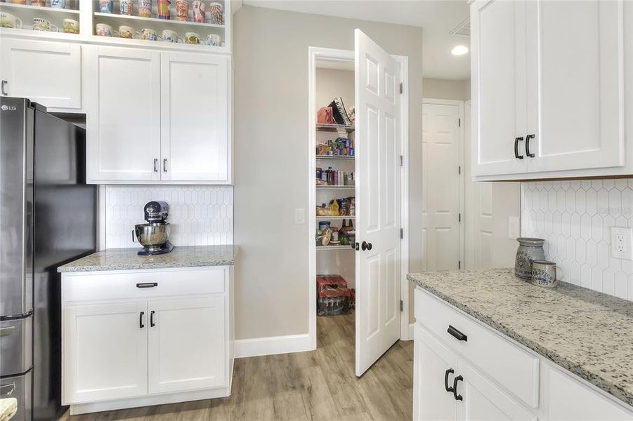 Kitchen pantry, and Garage entry.