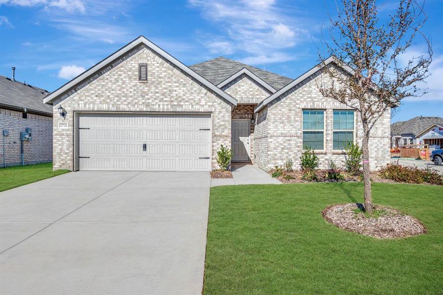 Front exterior of a new home in Verandah, Royse City, TX, highlighting curb appeal (Image 1). Front exterior of a new home in Verandah, Royse City, TX, highlighting curb appeal (Image 1).